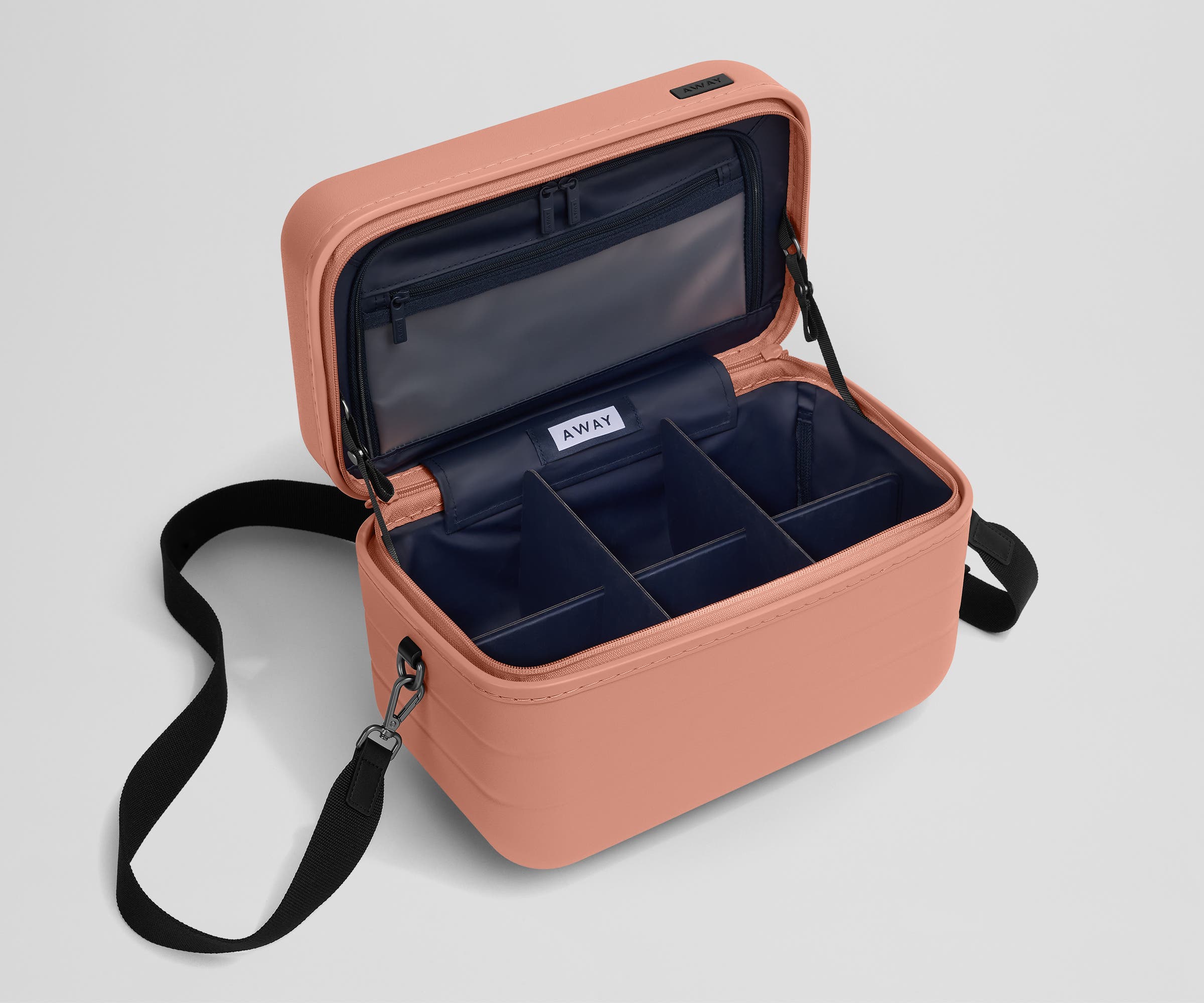 Removable fabric dividers in an empty Train Case