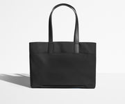 Trolley sleeve on the bag of the Everywhere Tote