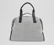 Front view of the Transit Canavs Weekender with its leather handles up
