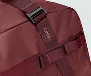 Close up view of the abrasion-resistant material and Away logo