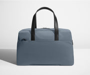 Back view of The Overnight bag with trolley sleeve pass-through