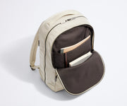 Front pocket packed with multiple notebooks