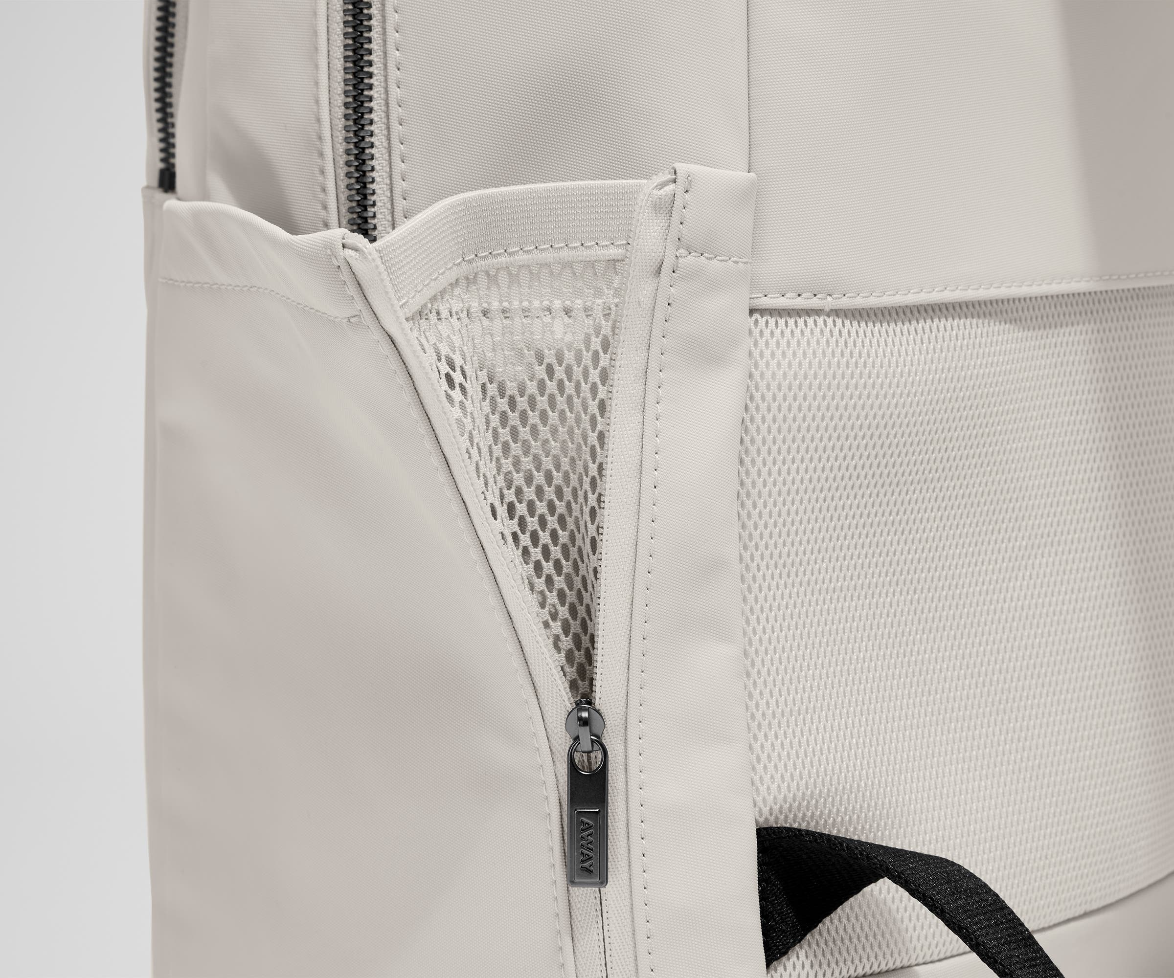 Close up view of the nylon material and exterior water bottle pocket