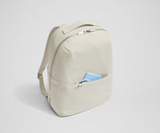 Small notebook and charging cord packed in the exterior front pocket