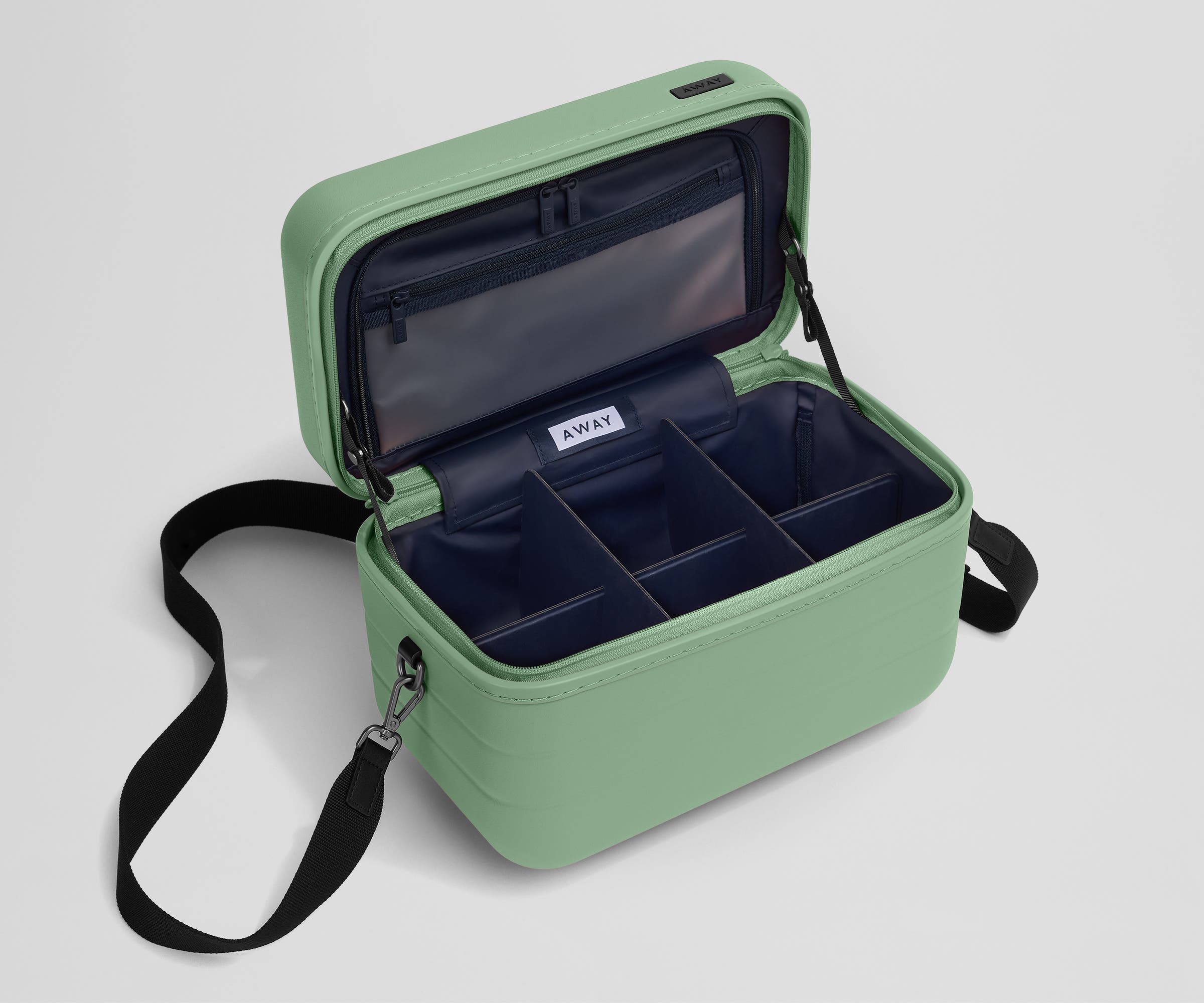 Removable fabric dividers in an empty Train Case