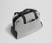 Phone and charging cord in the exterior slip pocket