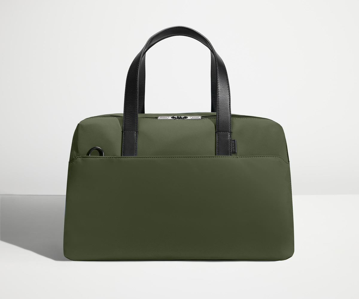 Front view of The Overnight Bag with leather straps up