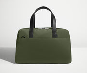 Front view of The Overnight Bag with leather straps up
