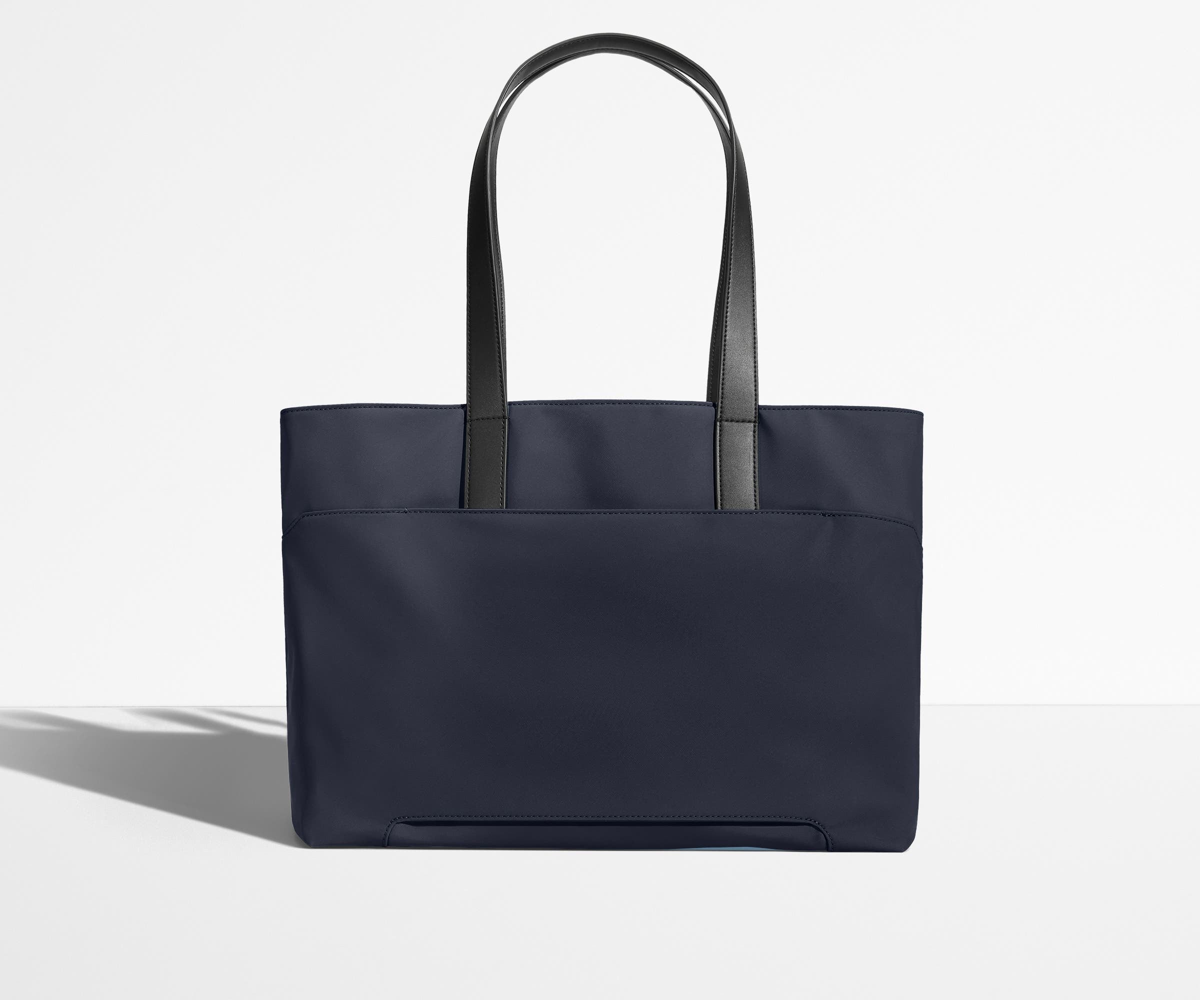 Trolley sleeve on the bag of the Everywhere Tote