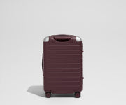 The Aluminum Edge Bigger Carry-On in Oxblood Red