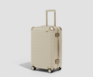 The Aluminum Edge Bigger Carry-On in Champagne White