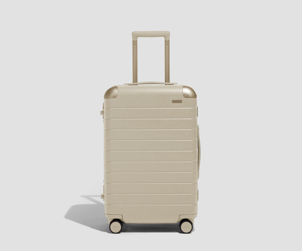 The Aluminum Edge Bigger Carry-On in Champagne White