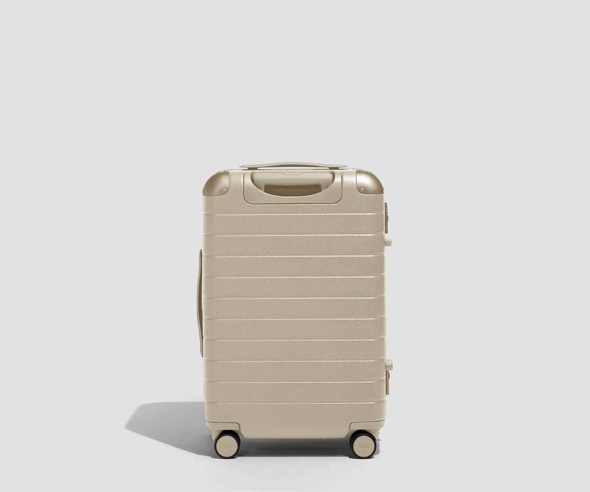 The Aluminum Edge Bigger Carry-On in Champagne White
