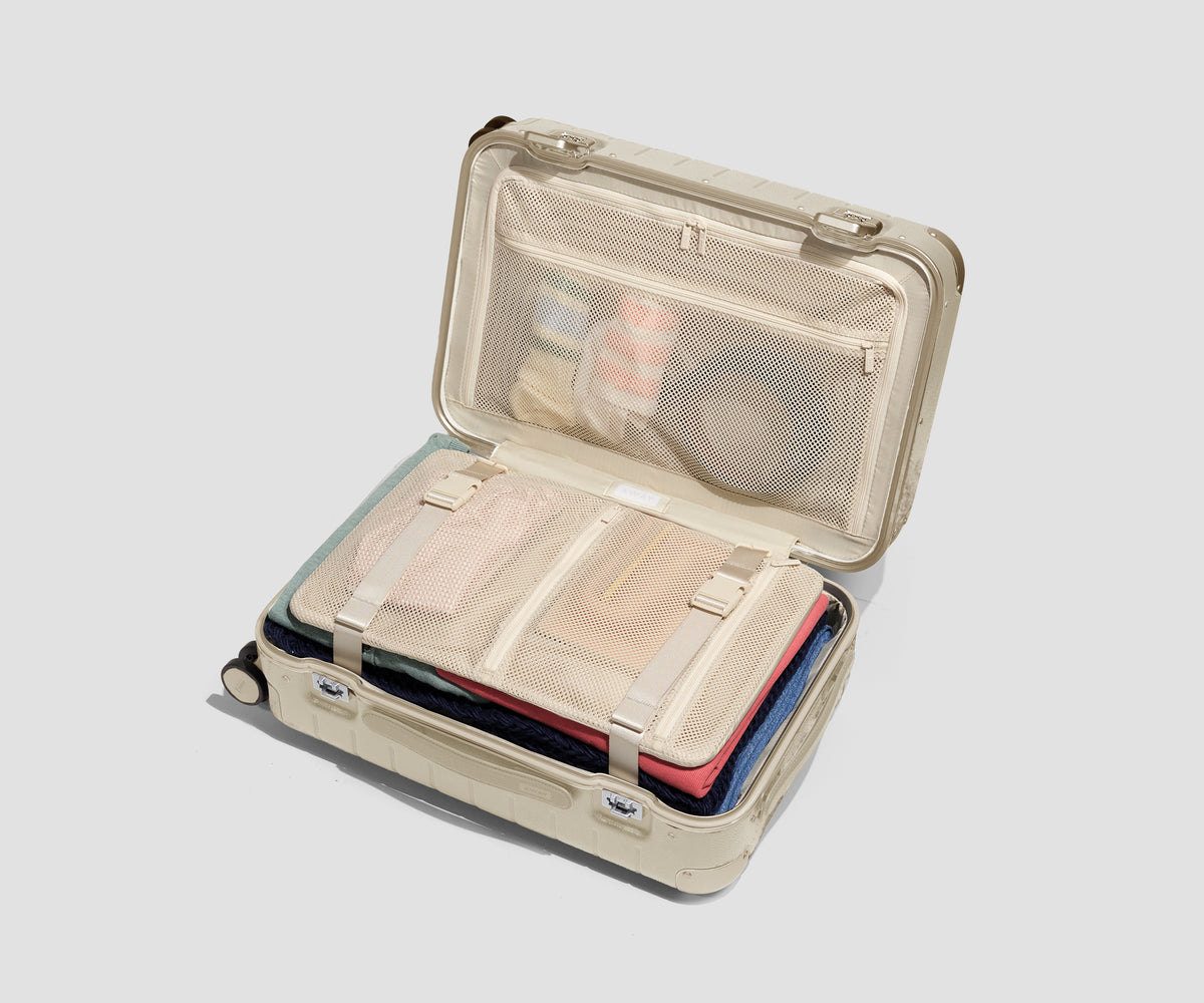 The Aluminum Edge Carry-On in Champagne White