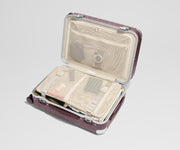 The Aluminum Edge Bigger Carry-On in Oxblood Red