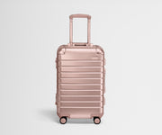 Front product view of a Rose Gold Aluminum Bigger Carry-On with handles raised