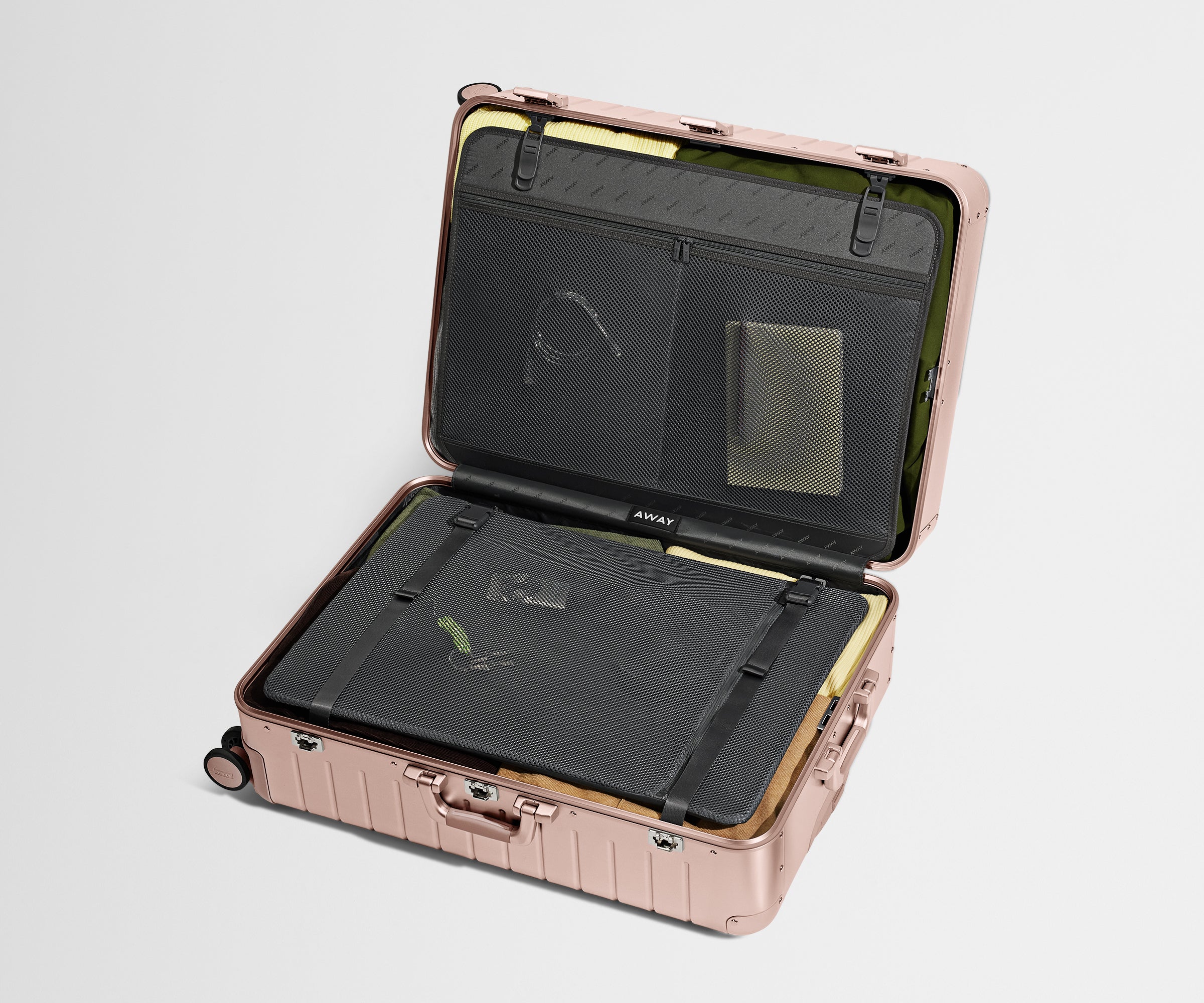 Large: Aluminum Edition in Rose Gold shown packed