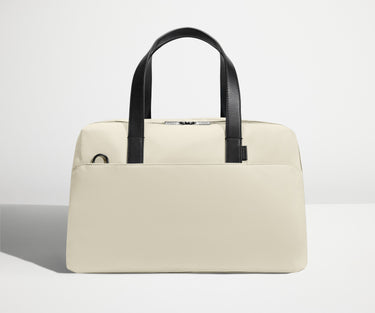 Front view of The Overnight Bag with leather straps up
