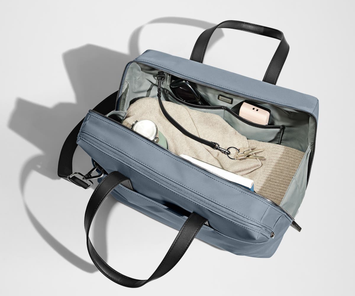 A pair of keys attached to the key leash in the main compartment