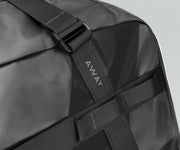 Close up view of the abrasion-resistant material and Away logo