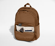 Phone, passport, and keys in their dedicated pockets in the front zip pocket
