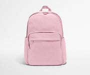 Pink backpack on a light gray background