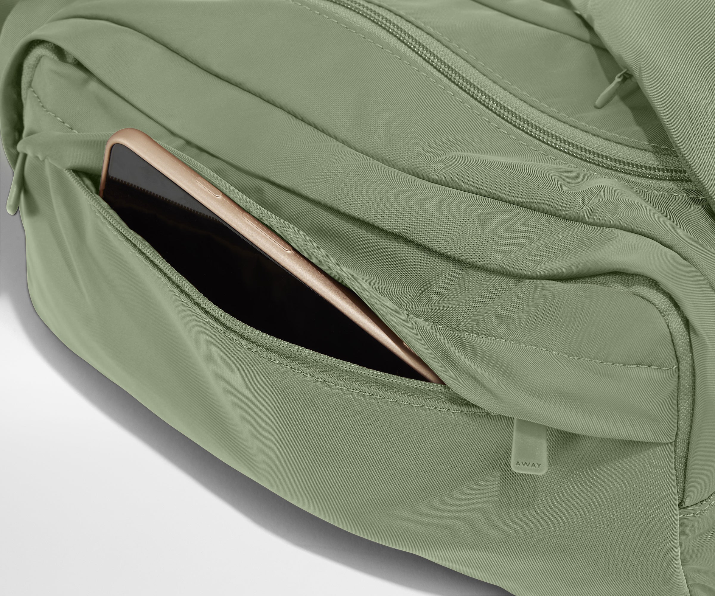 Phone packed in the front zip pocket