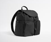Black backpack on a light gray background