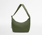 Green shoulder bag on a light gray background