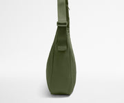 Green shoulder bag on a white background