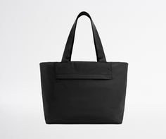 Black tote bag on a white background
