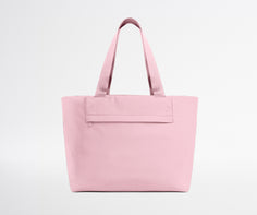 Pink tote bag on a light gray background