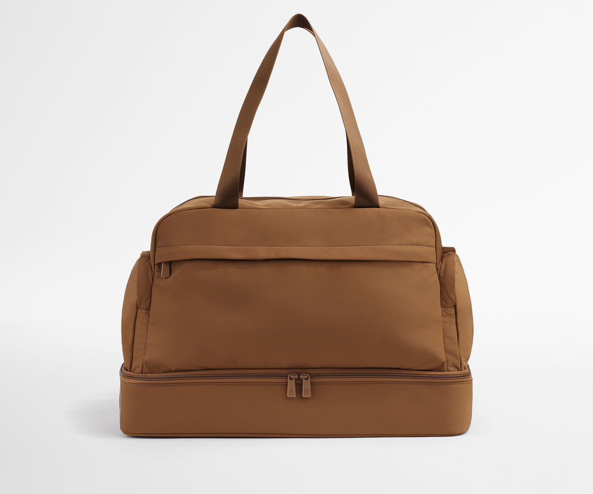 Front view of Featherlight Weekender with the handles up