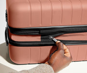 Hand unzipping the additional wraparound expandsion feature