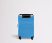 Back product view of The Bigger Carry-On Flex suitcase in Splash Blue