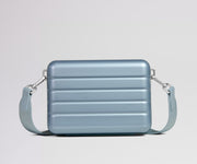 Blue crossbody bag on a light gray background