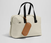 Sunglasses pouch attached to the Everywhere Bag strap