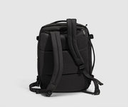 Back view showing the removable, padded shoulder straps that can tuck into a back pocket to convert into a duffle