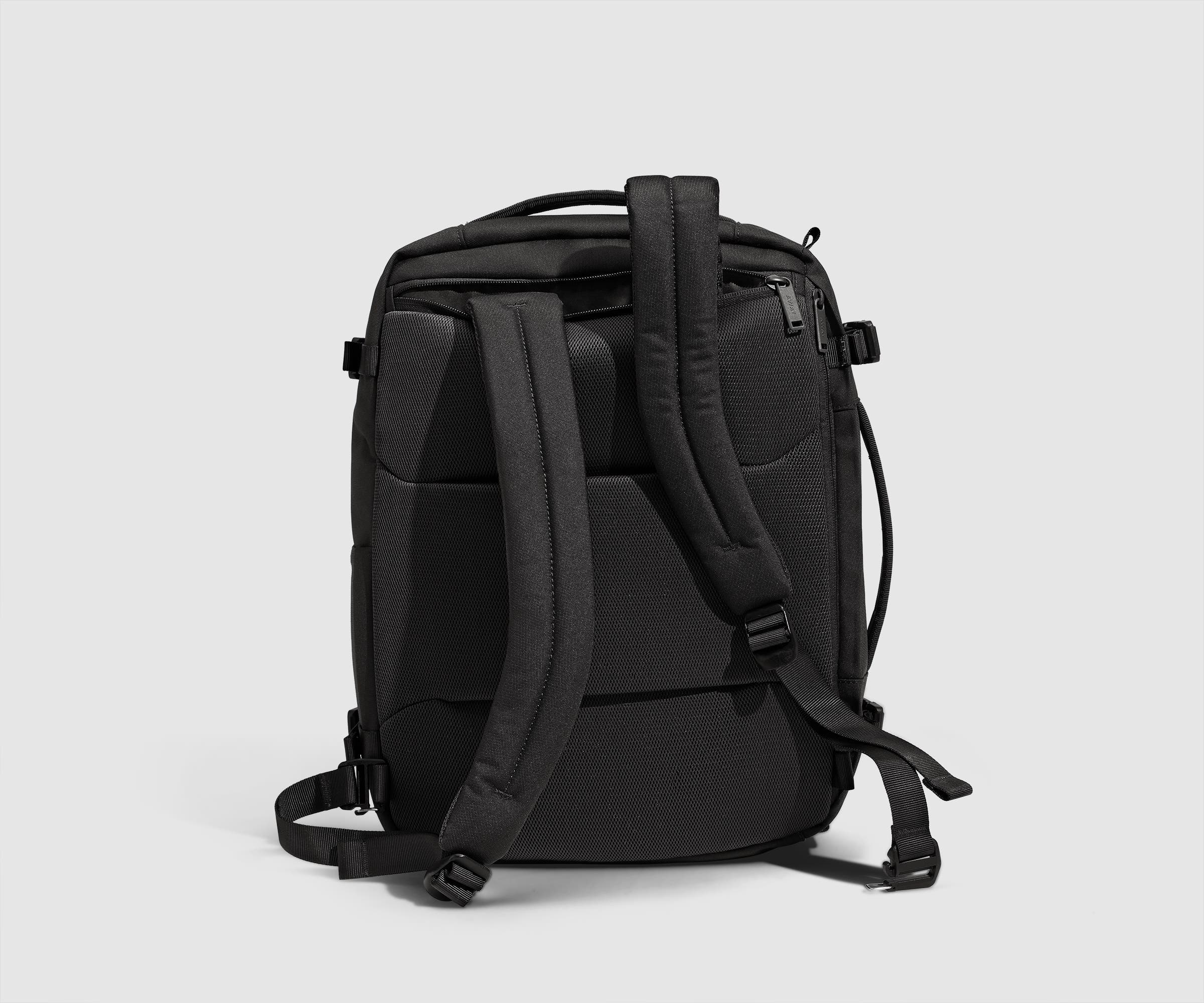 Back view showing the removable, padded shoulder straps that can tuck into a back pocket to convert into a duffle