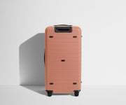 Back product view of The Trunk suitcase in Clay Pink