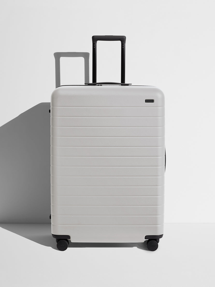 Front view of a Cloud Gray large suitcase