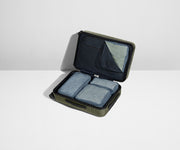 Four Insider Packing Cubes shown inside The Bigger Carry-On