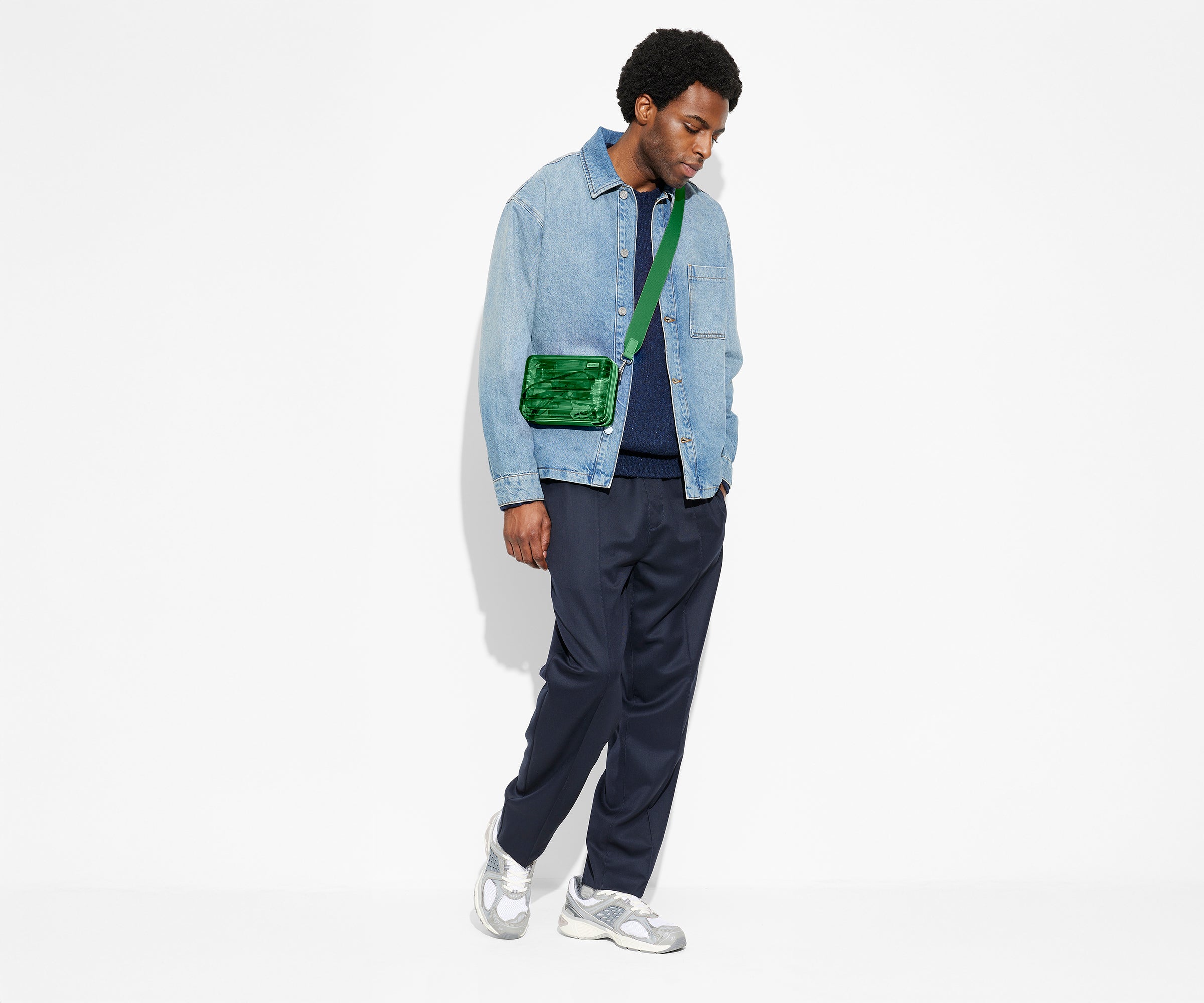 Person wearing The Mini Crossbody in Translucent Green