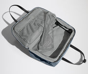 Open, unpacked Weekender Bag showing the mesh compartments and pockets