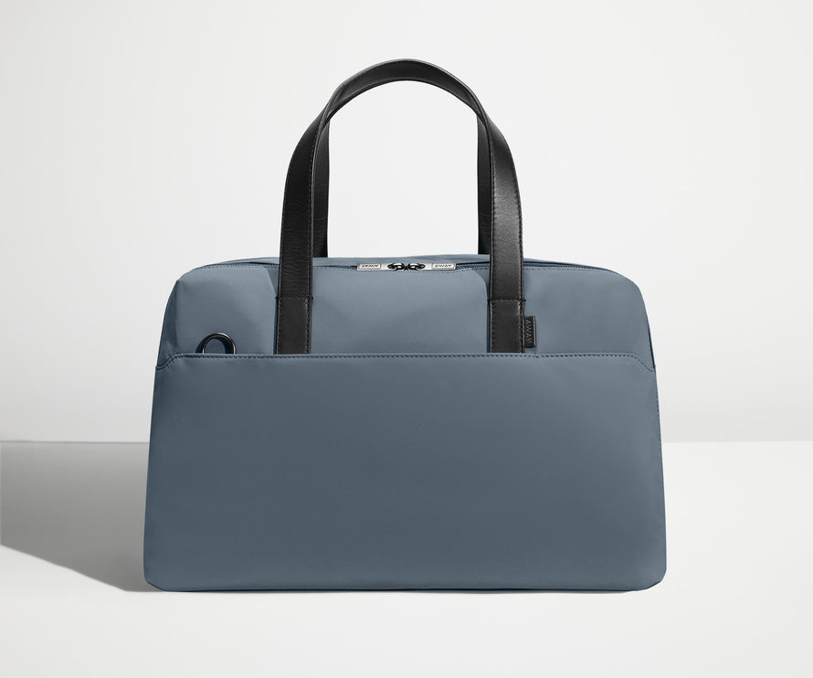 Front view of The Overnight Bag with leather straps up