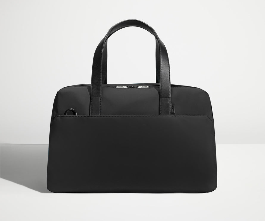 Front view of The Overnight Bag with leather straps up