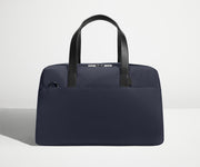 Front view of The Overnight Bag with leather straps up