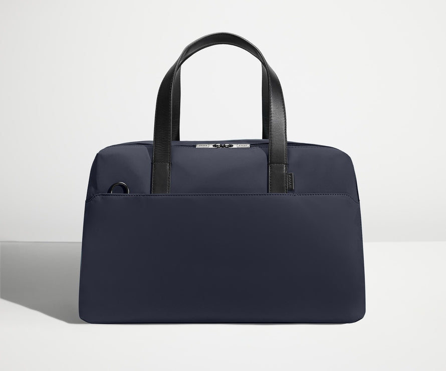 Front view of The Overnight Bag with leather straps up