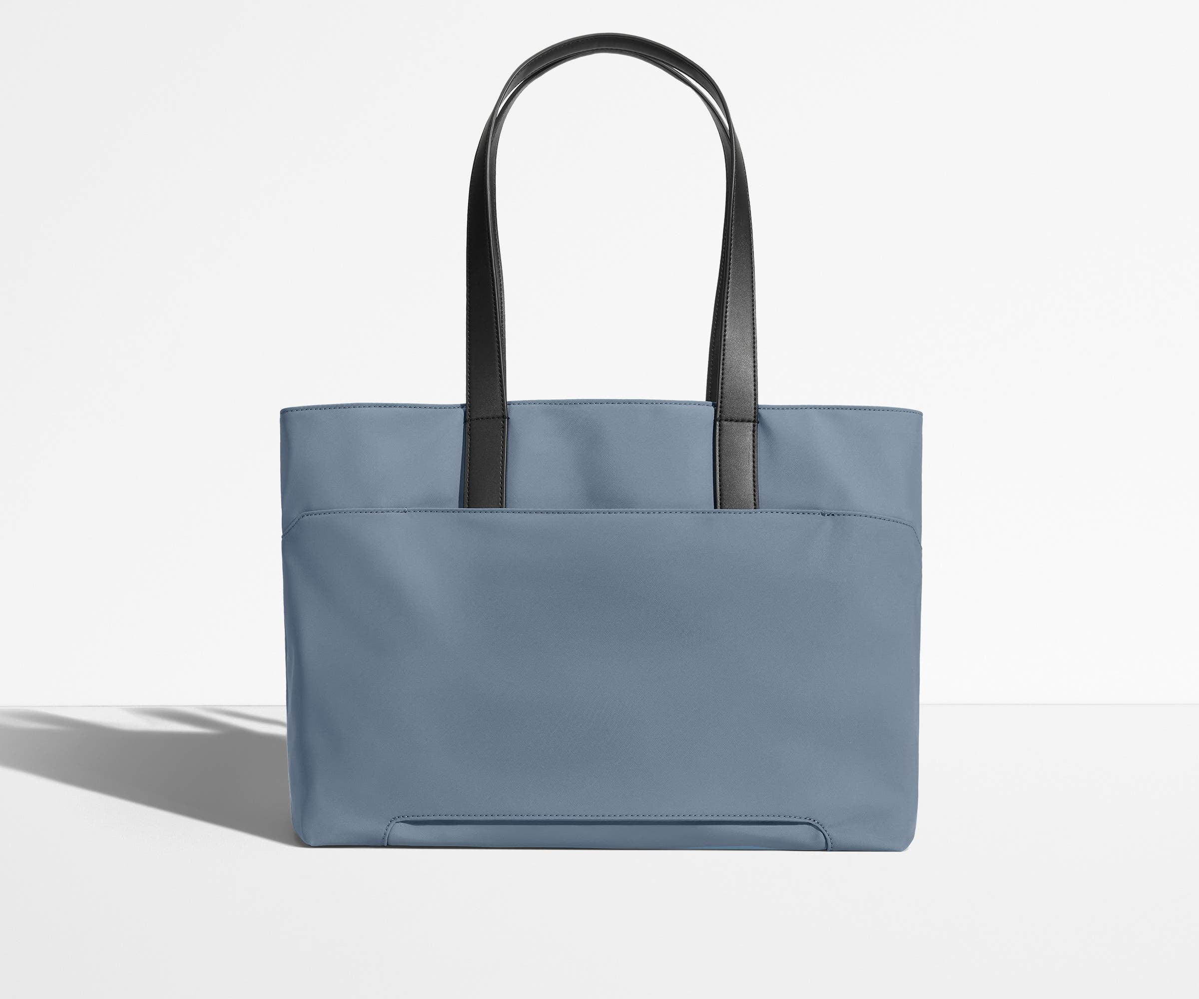 Trolley sleeve on the bag of the Everywhere Tote