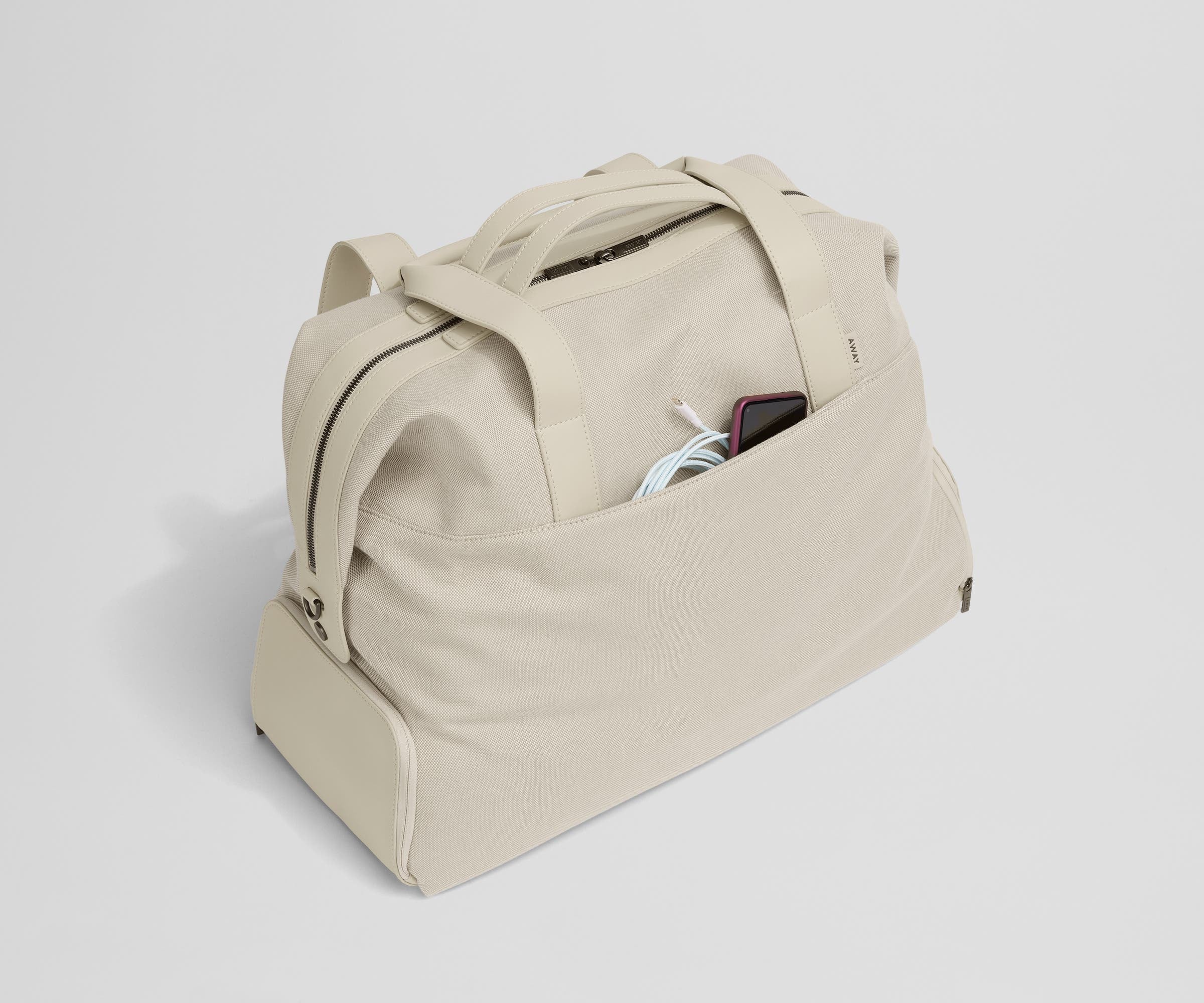 Phone and charging cord in the exterior slip pocket